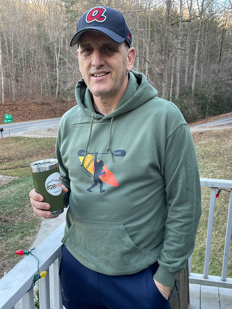 military green hoodie with bigfoot carrying a kayak smoky mountains
